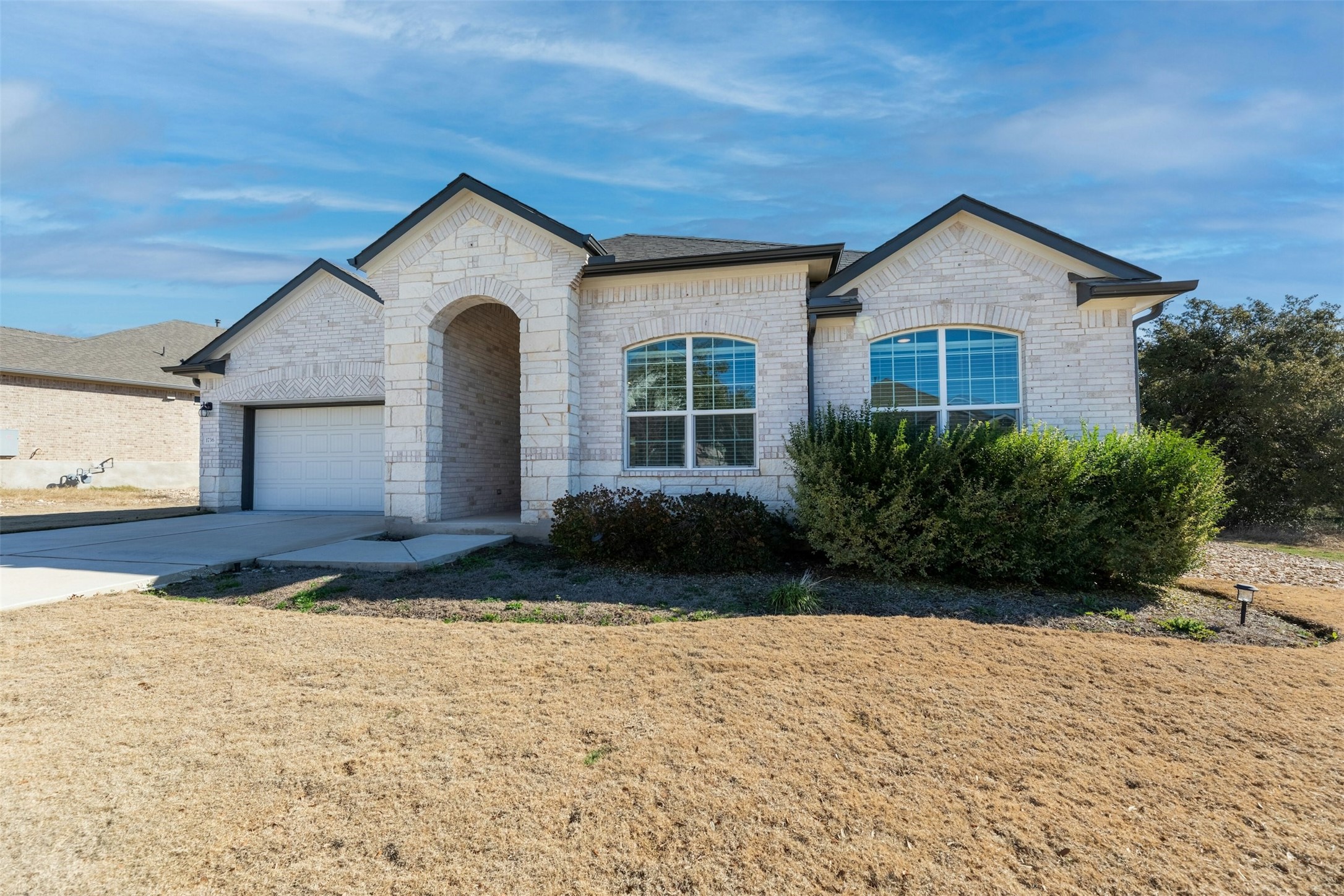 1736 Weavers Bend Georgetown, TX 78628 - Photo 4 of 40 Offering four bedrooms, three bathrooms, and a dedicated office, this residence is designed for both comfort and sophistication.