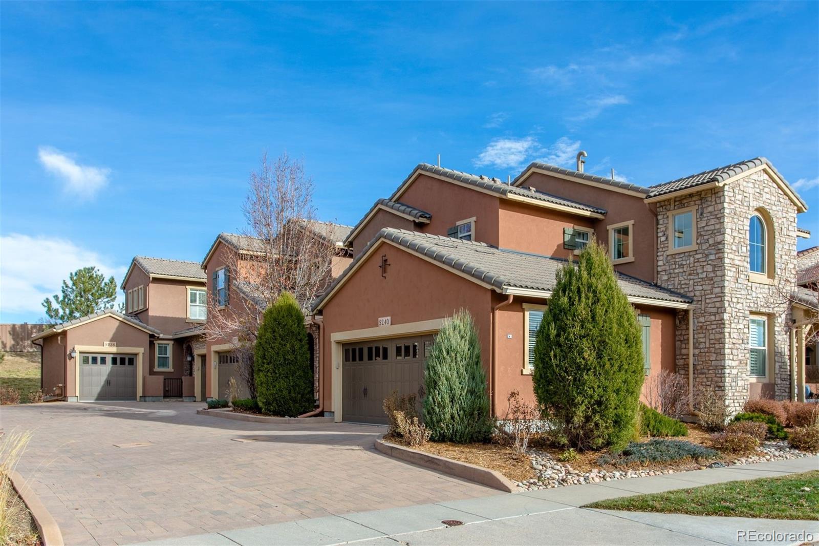 9236 Viaggio Way Highlands Ranch, CO 80126 - Photo 2 of 41 front view of house with a street