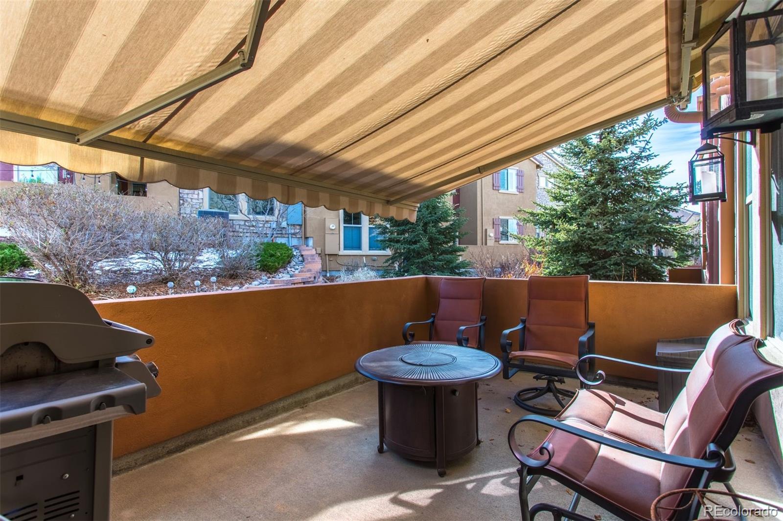 9236 Viaggio Way Highlands Ranch, CO 80126 - Photo 23 of 41 a view of a outdoor space with seating area