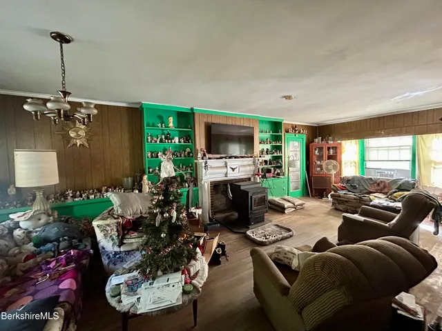 a playing room with toys and a wooden floor