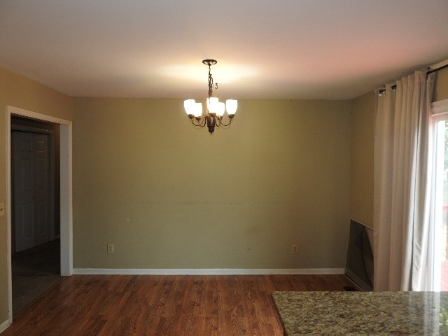 3557 Mahlon Moore Road Spring Hill, TN 37174 - Photo 12 of 29 a view of a livingroom with a chandelier