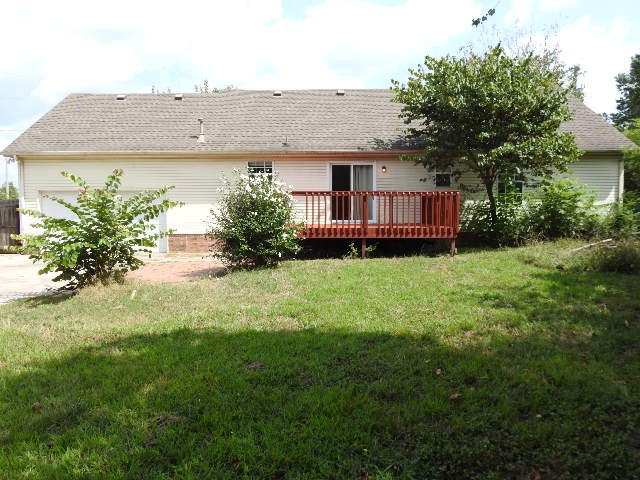 3557 Mahlon Moore Road Spring Hill, TN 37174 - Photo 6 of 29 a view of a house with a yard and plants