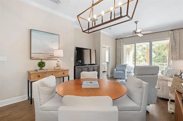 a bedroom with a bed a mirror and a window