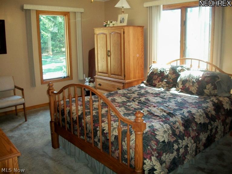 The Master Bedroom which also has a private bathroom with a double sink.