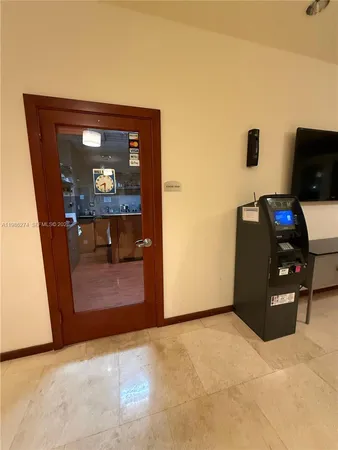 a room with gym equipment and mirror