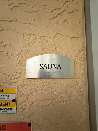 a kitchen with a sink stove and refrigerator