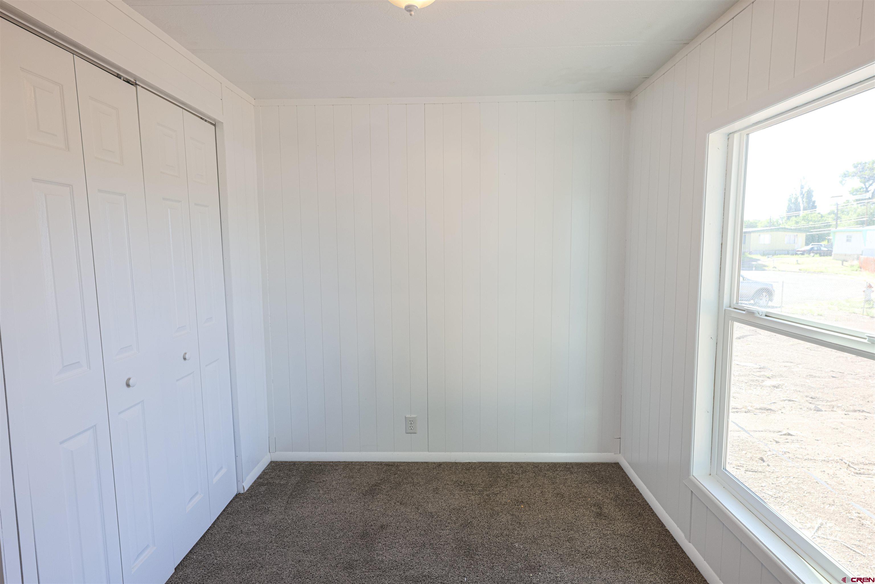 11 Rickey Place Monte Vista, CO 81144 - Photo 15 of 20 an empty room with windows