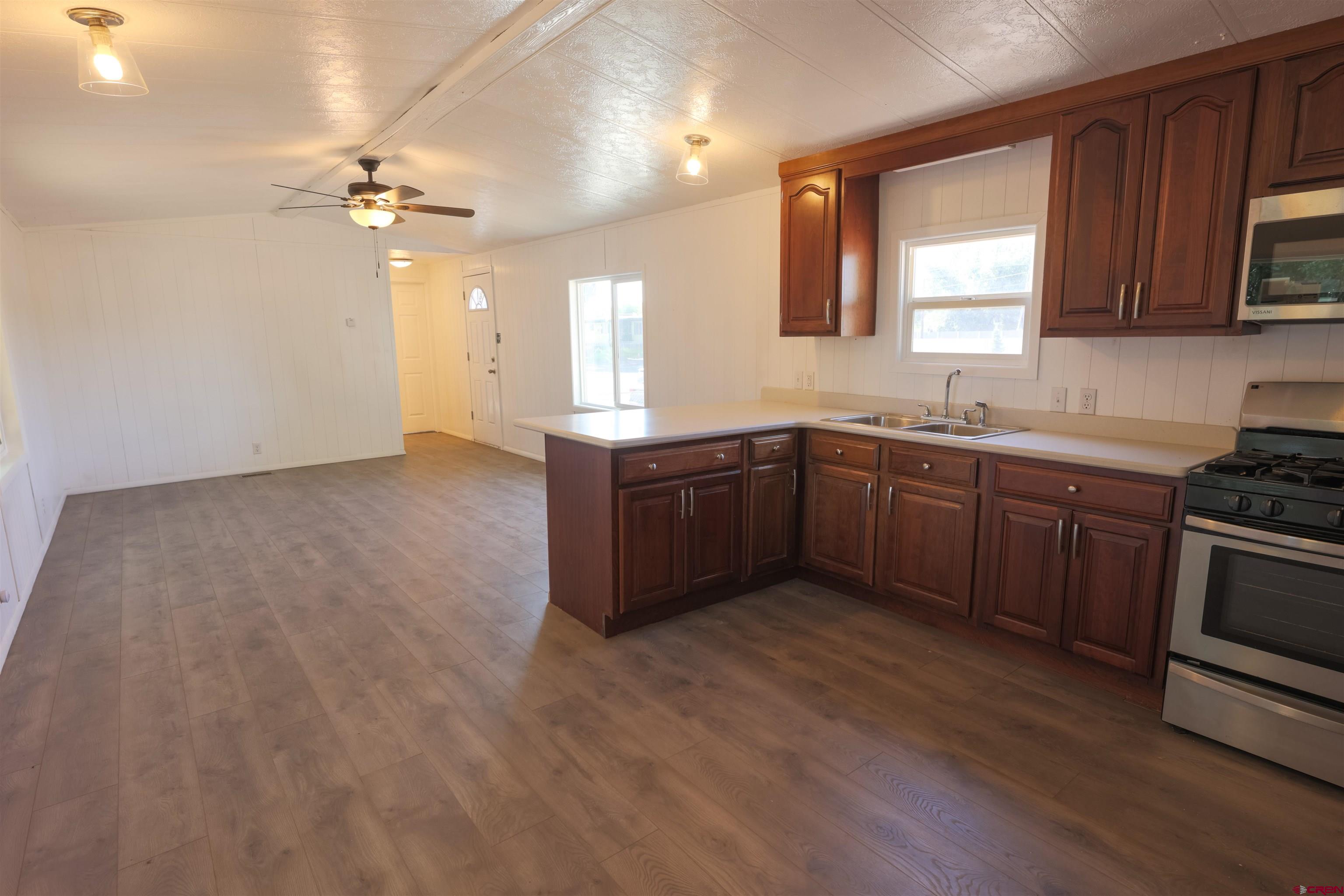 11 Rickey Place Monte Vista, CO 81144 - Photo 8 of 20 a kitchen with sink and cabinets