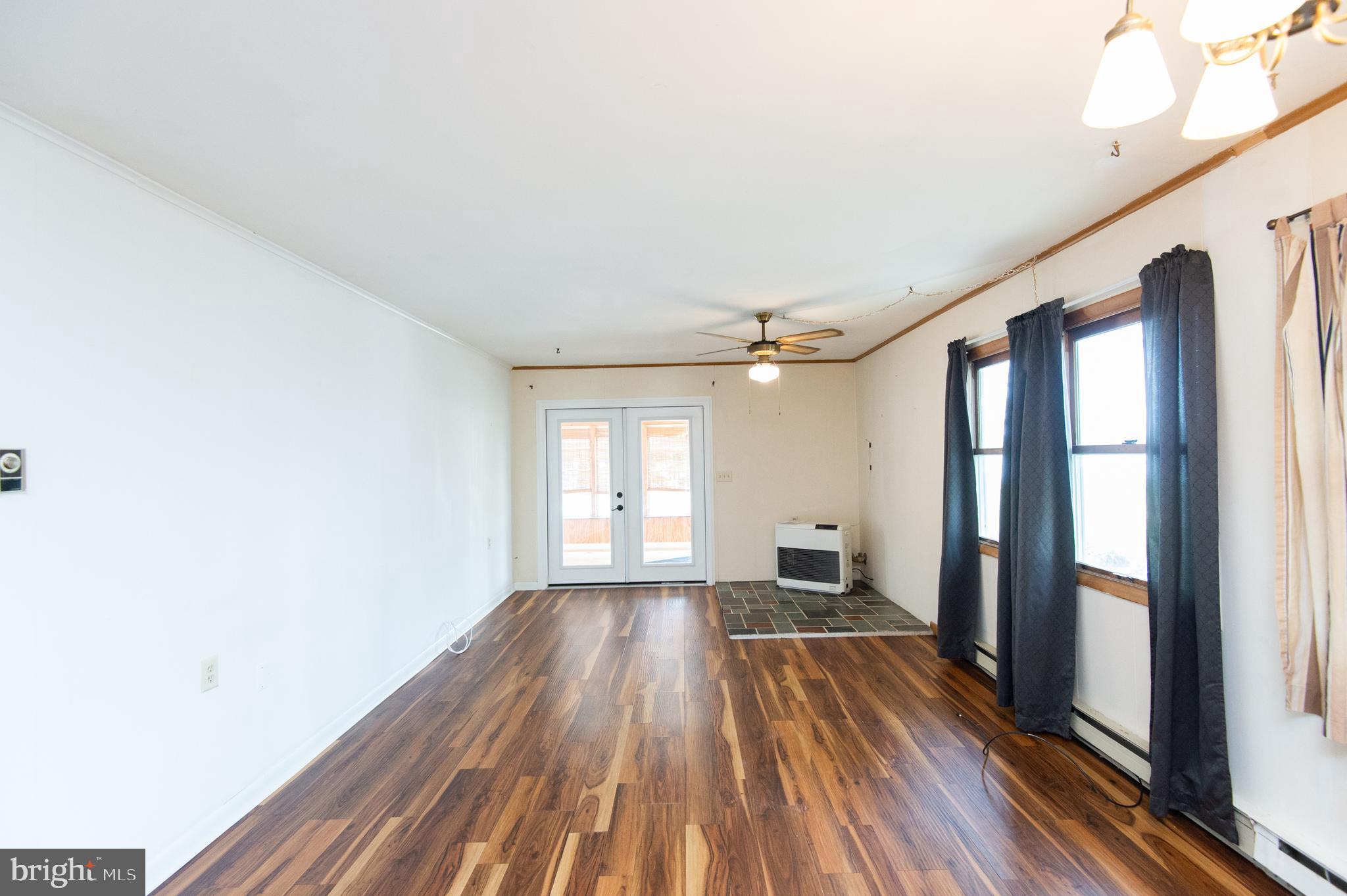 5023 Russell Road Woolford, MD 21677 - Photo 7 of 32 Dining & Living Area