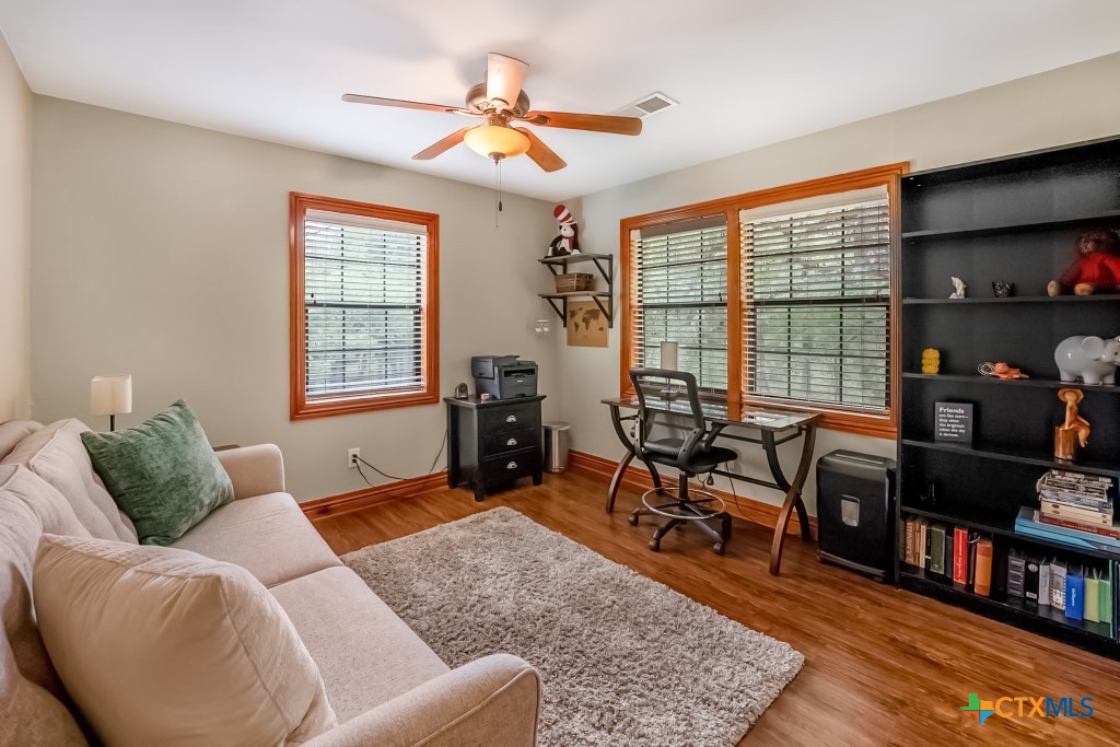 805 Sunrise Trail Spring Branch, TX 78070 - Photo 11 of 25 a living room with furniture and a window