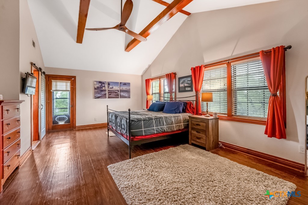 805 Sunrise Trail Spring Branch, TX 78070 - Photo 15 of 25 a bedroom with furniture and a window