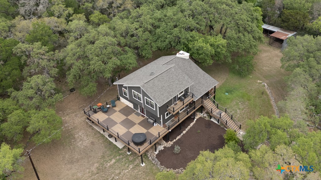 805 Sunrise Trail Spring Branch, TX 78070 - Photo 24 of 25 an aerial view of a house having yard