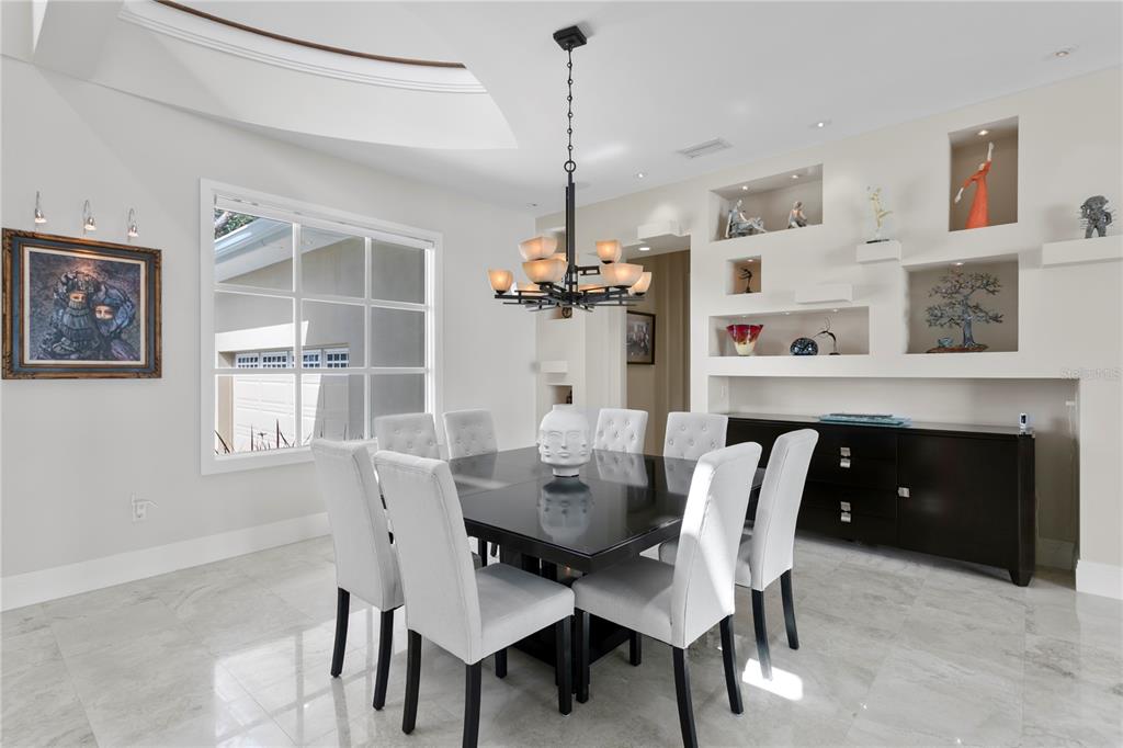 2279 Mermaid Point Northeast St. Petersburg, FL 33703 - Photo 12 of 100 a dining room with furniture and window