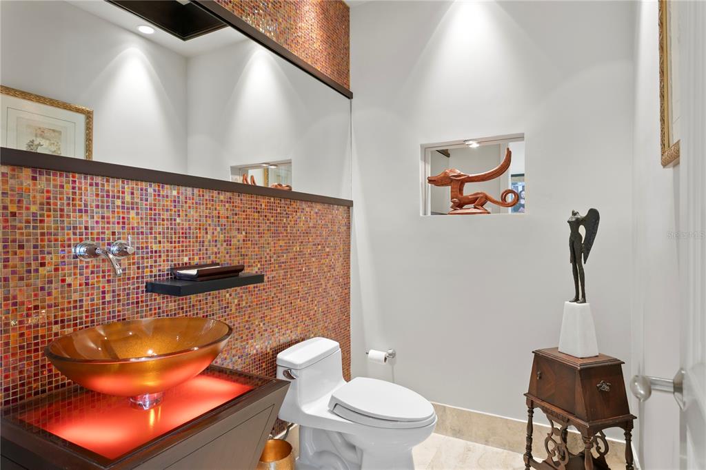 2279 Mermaid Point Northeast St. Petersburg, FL 33703 - Photo 14 of 100 a bathroom with a toilet and a sink