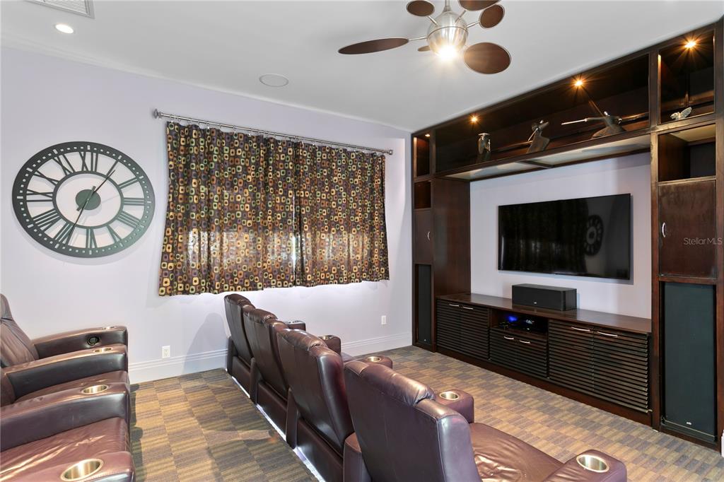 2279 Mermaid Point Northeast St. Petersburg, FL 33703 - Photo 40 of 100 a living room with furniture and a flat screen tv