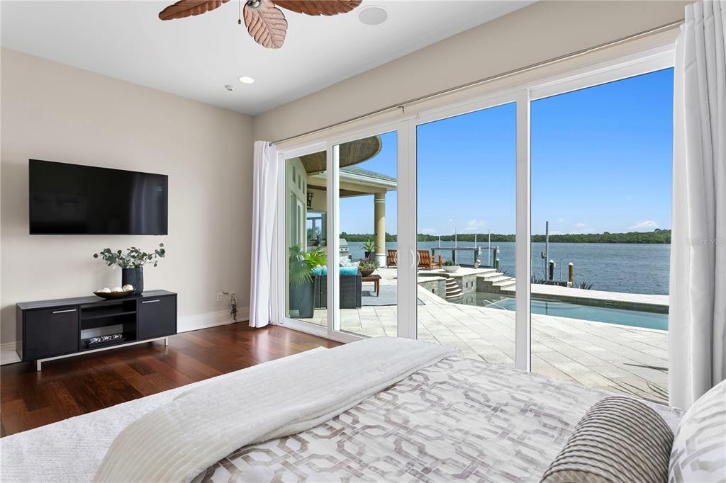 2279 Mermaid Point Northeast St. Petersburg, FL 33703 - Photo 43 of 100 a living room with furniture and a flat screen tv