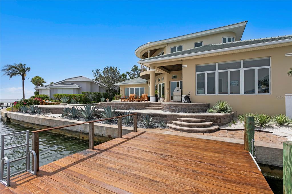 2279 Mermaid Point Northeast St. Petersburg, FL 33703 - Photo 65 of 100 a front view of a house with sitting area