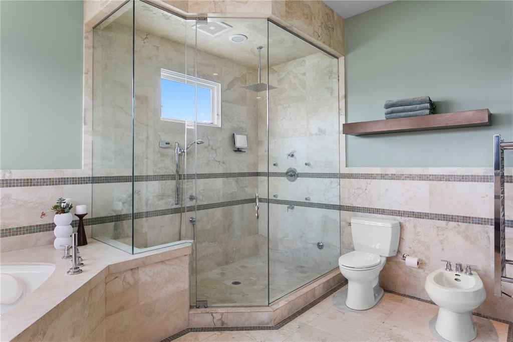 2279 Mermaid Point Northeast St. Petersburg, FL 33703 - Photo 77 of 100 a bathroom with a toilet and a sink