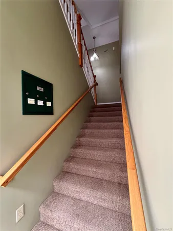 a view of a room with racks on the wall