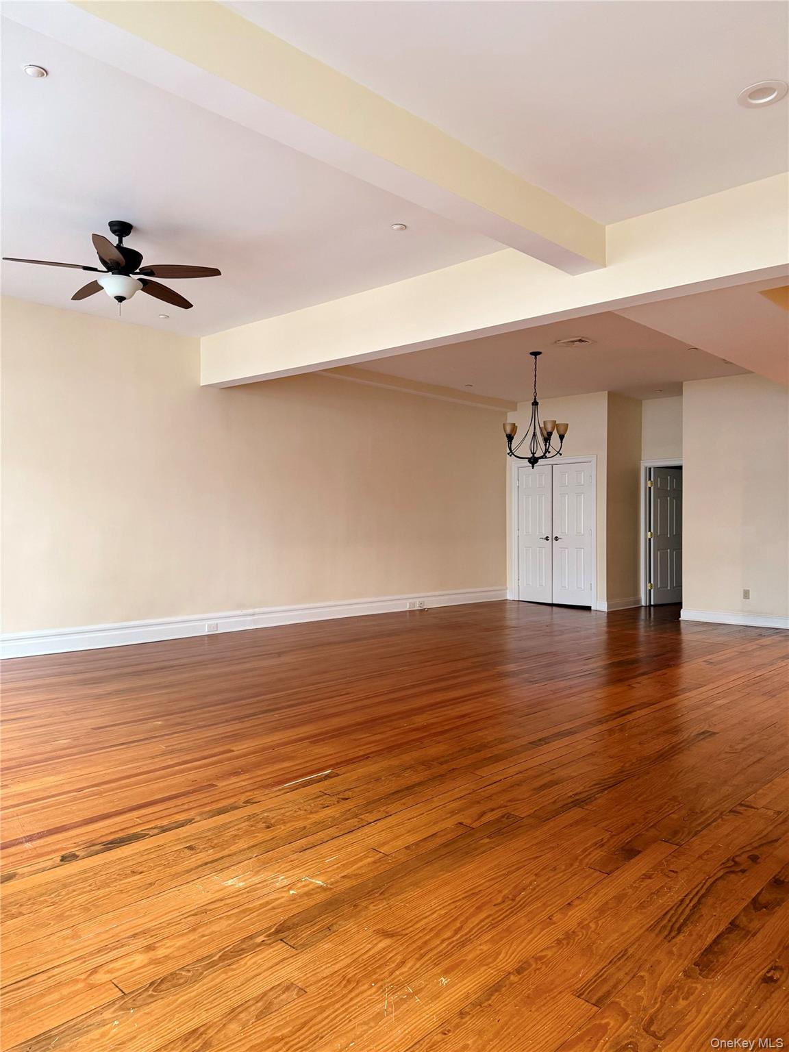 337 Main Street, Unit 2F Poughkeepsie, NY 12601 - Photo 6 of 25 a view of empty room with wooden floor