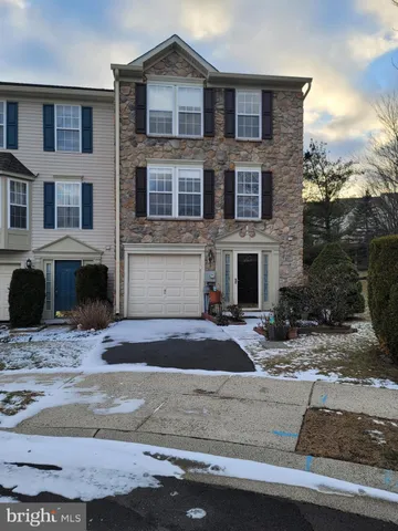 a front view of a house with yard