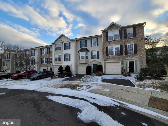 a view of a car park in front of a building