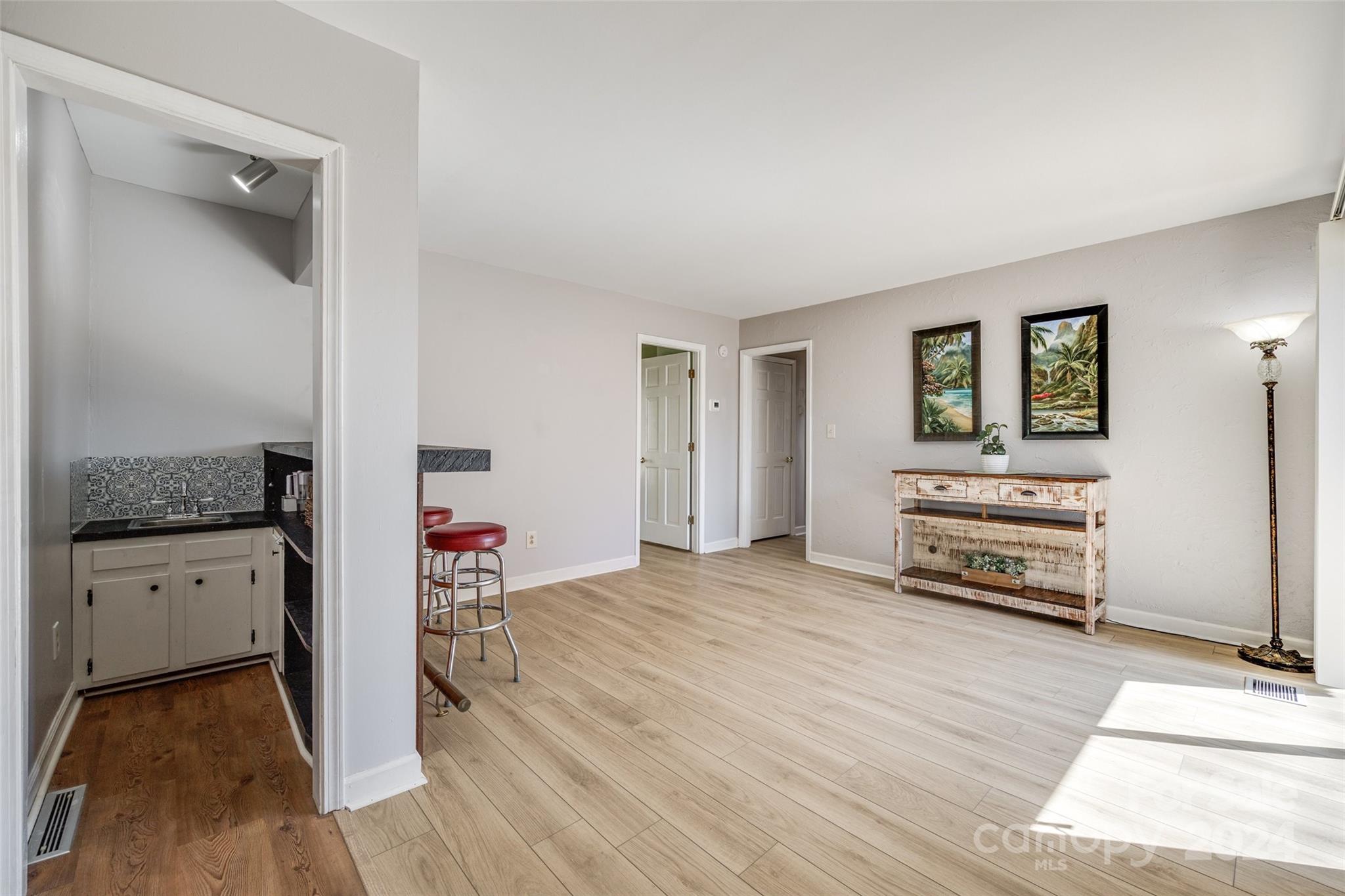 16039 Samoa Court Fort Mill, SC 29708 - Photo 17 of 30 a living room with furniture and a wooden floor