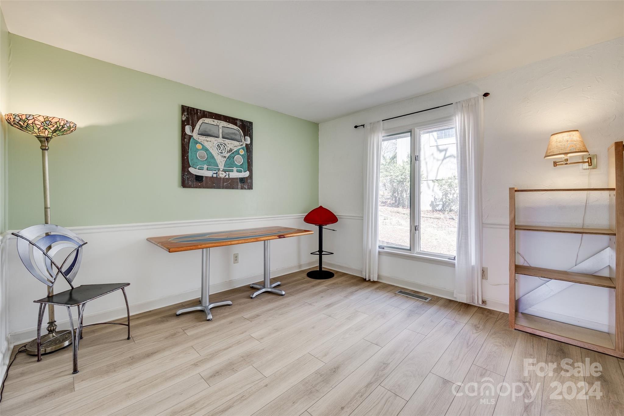 16039 Samoa Court Fort Mill, SC 29708 - Photo 19 of 30 a view of an empty room with window and wooden floor