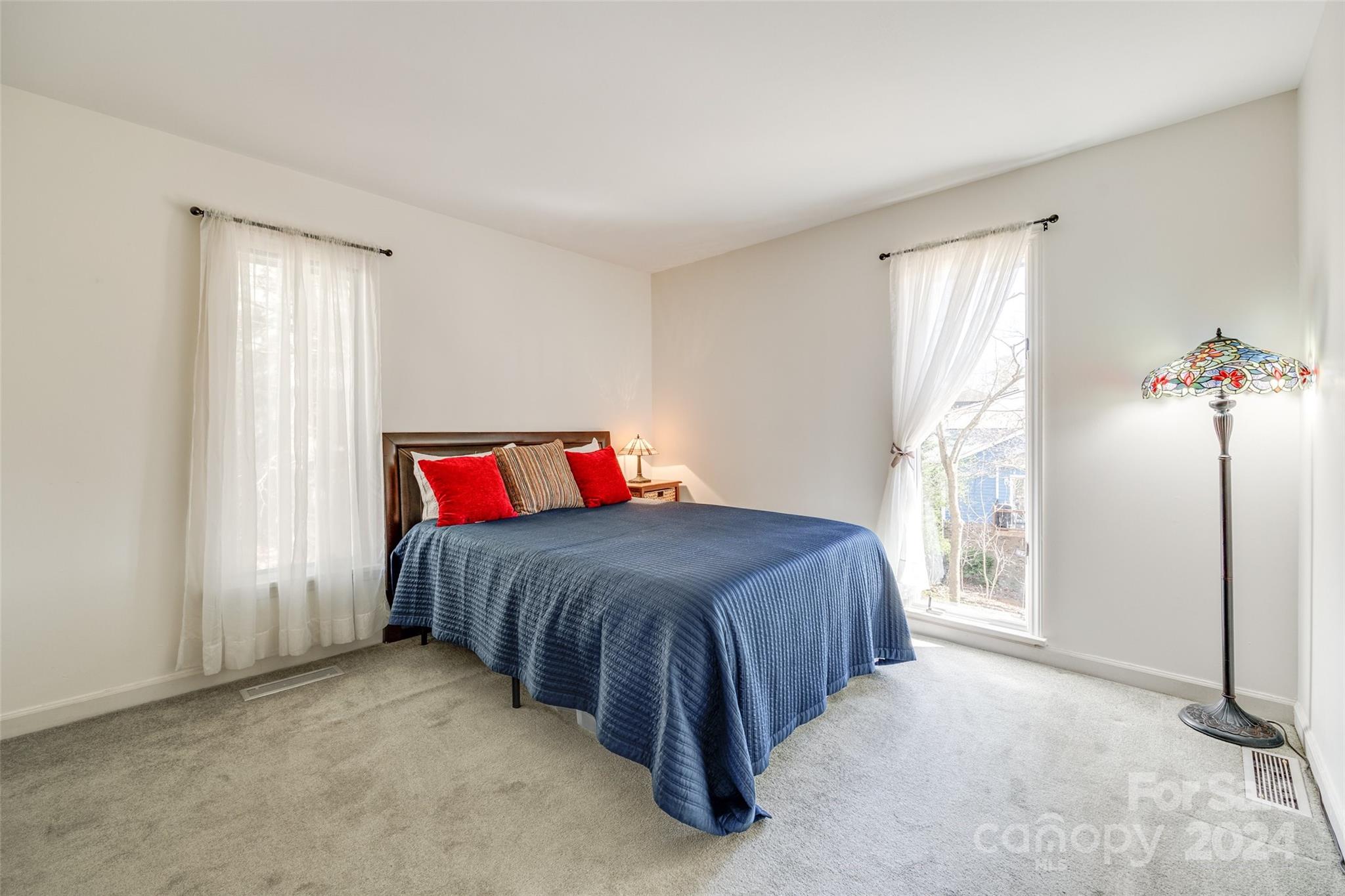 16039 Samoa Court Fort Mill, SC 29708 - Photo 20 of 30 a bedroom with a bed and a window
