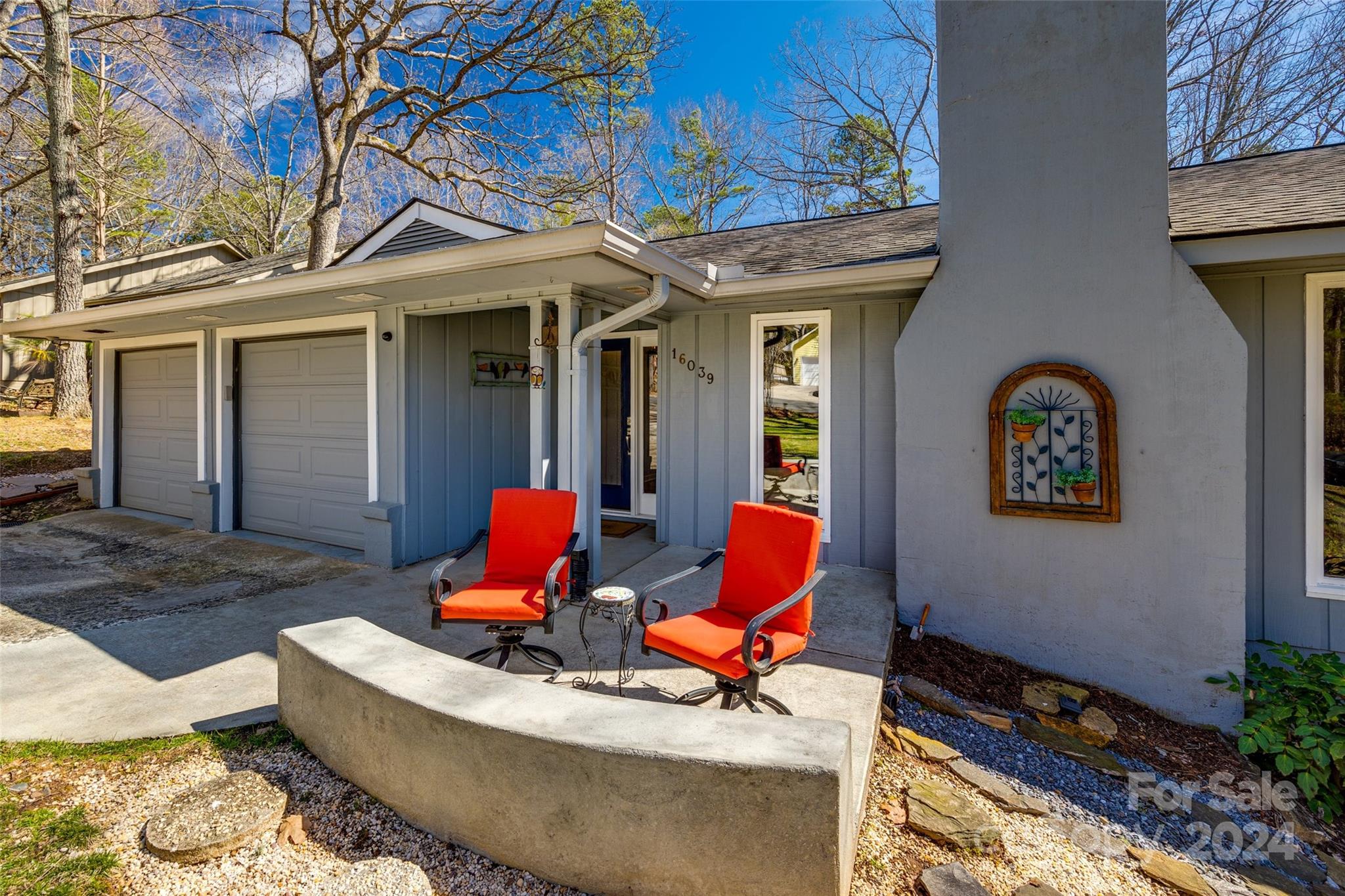 16039 Samoa Court Fort Mill, SC 29708 - Photo 2 of 30 a backyard of a house with seating space