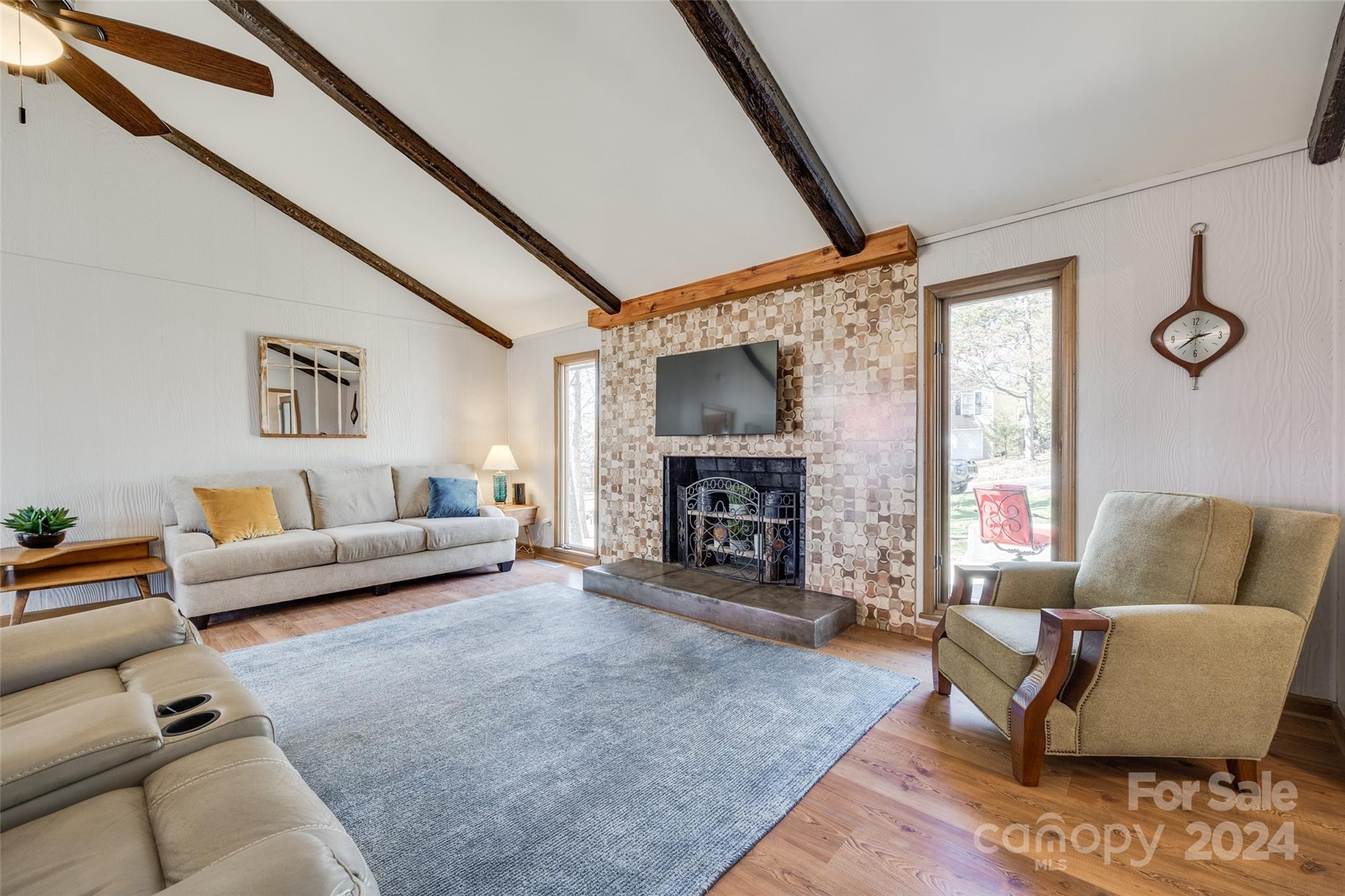 16039 Samoa Court Fort Mill, SC 29708 - Photo 5 of 30 a living room with furniture and a fireplace