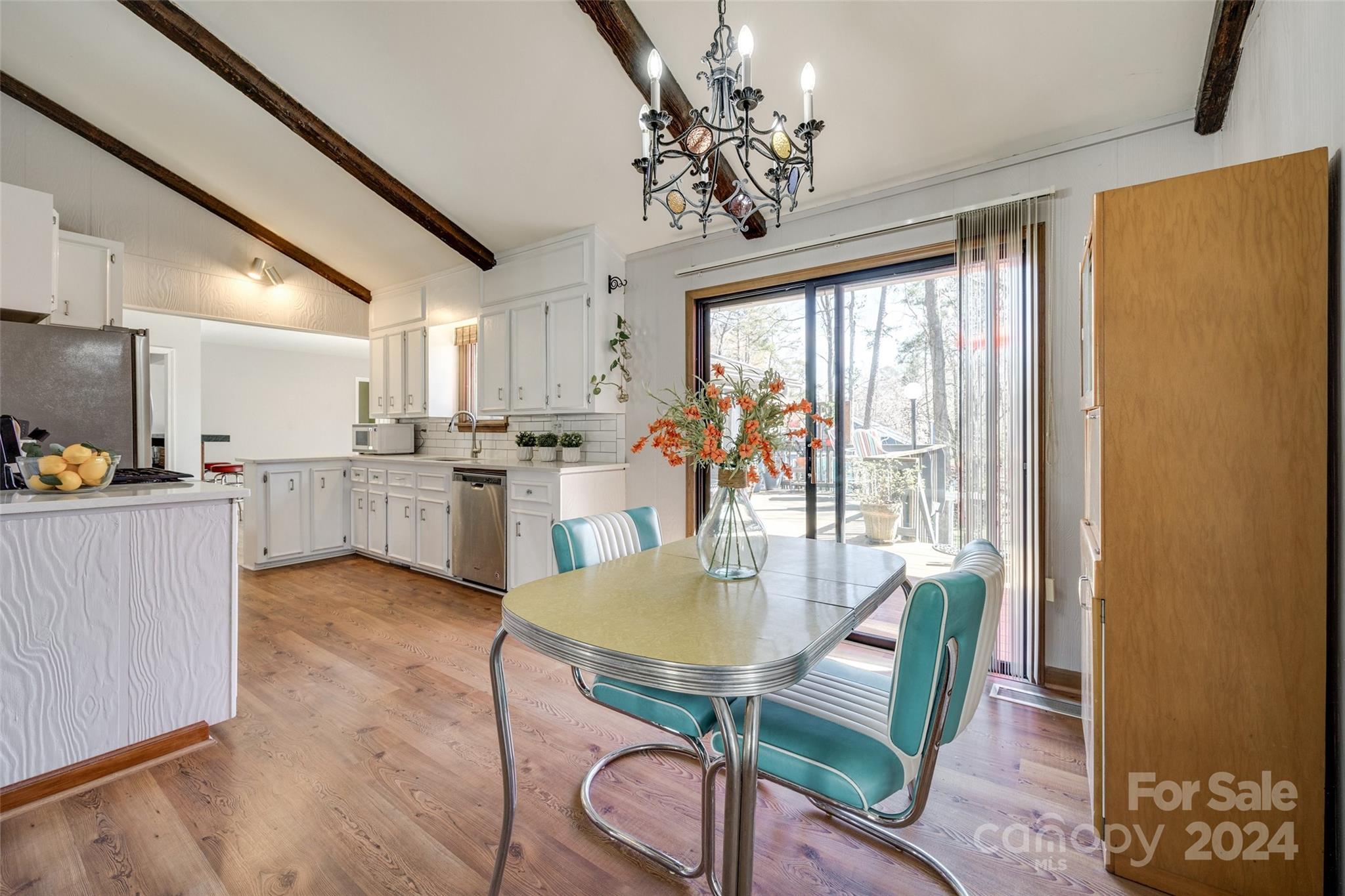 16039 Samoa Court Fort Mill, SC 29708 - Photo 7 of 30 a view of a dining room with furniture window and outside view