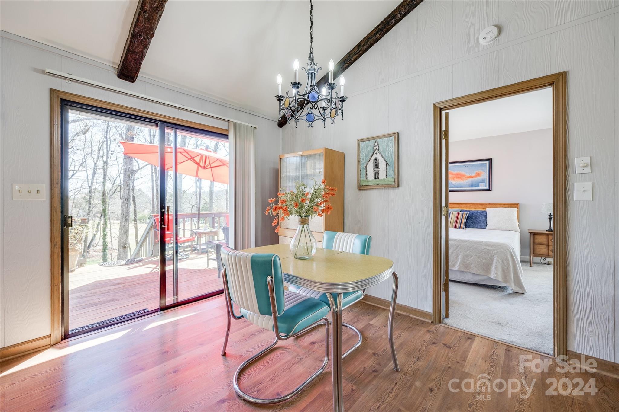 16039 Samoa Court Fort Mill, SC 29708 - Photo 8 of 30 a view of a dining room with furniture window and wooden floor