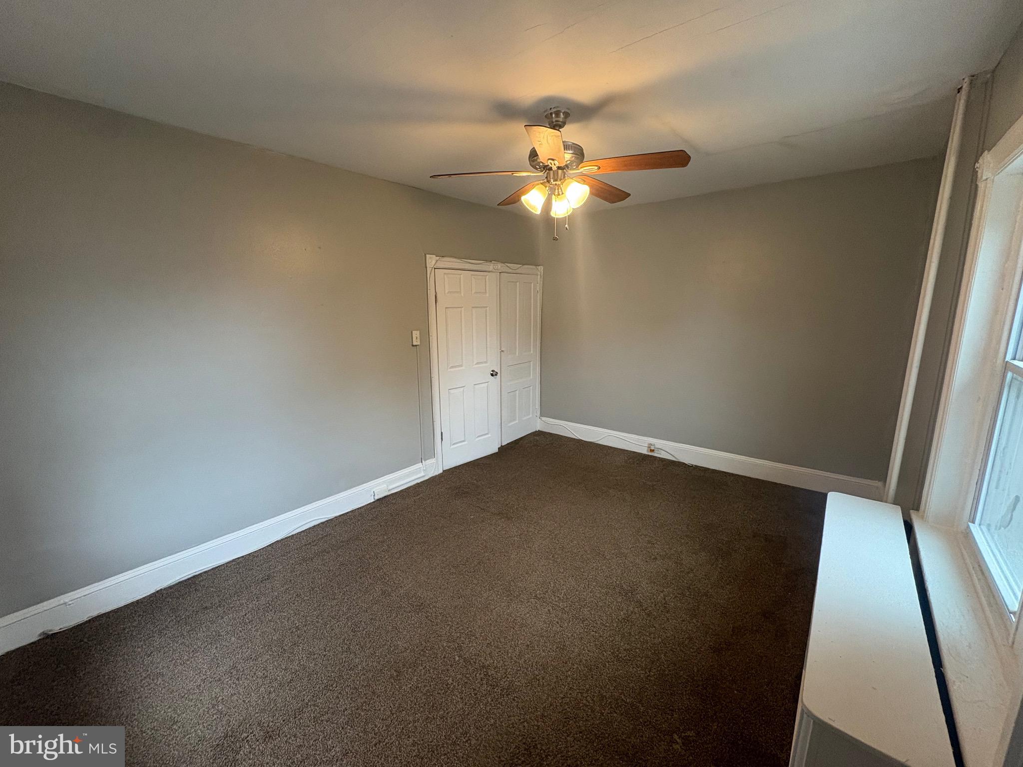 1337 71st Avenue, Unit 2 Philadelphia, PA 19126 - Photo 11 of 16 an empty room with a mirror