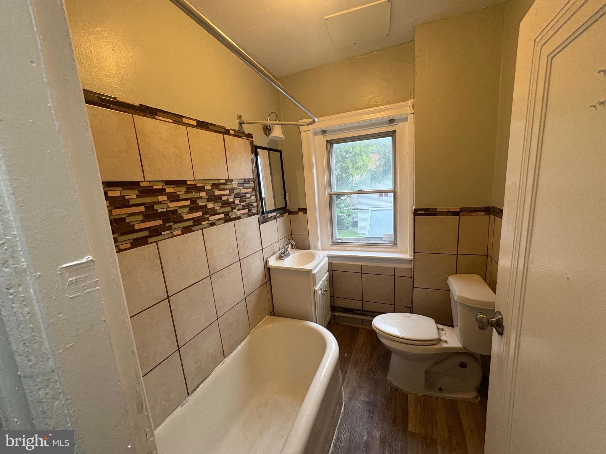 1337 71st Avenue, Unit 2 Philadelphia, PA 19126 - Photo 8 of 16 a bathroom with a sink toilet and shower