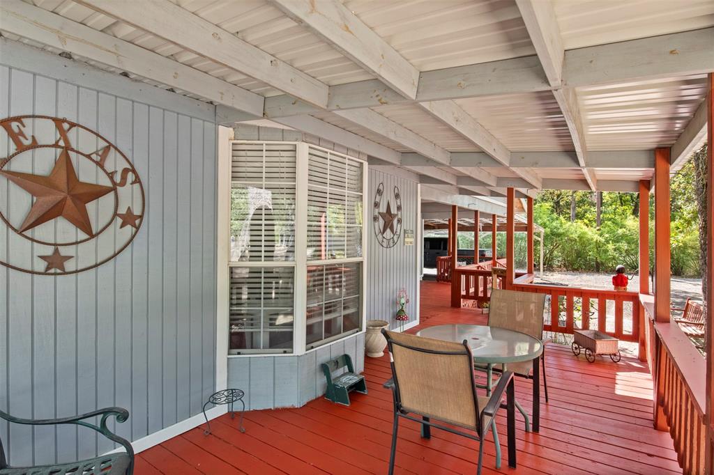 14802 North 3rd Street Scurry, TX 75158 - Photo 21 of 40 a dining room with furniture window and wooden floor