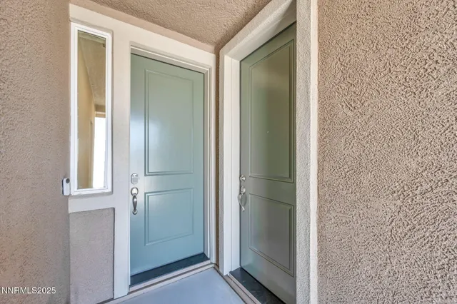 a view of entryway with bathroom
