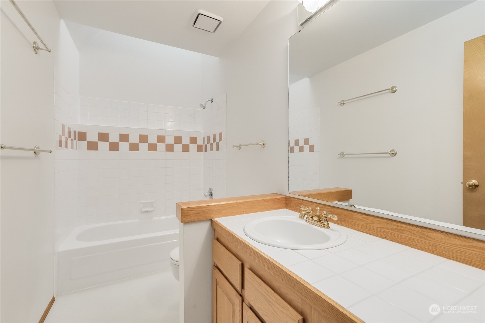 2667 Southwest 343rd Street Federal Way, WA 98023 - Photo 15 of 24 a bathroom with a sink and a bathtub