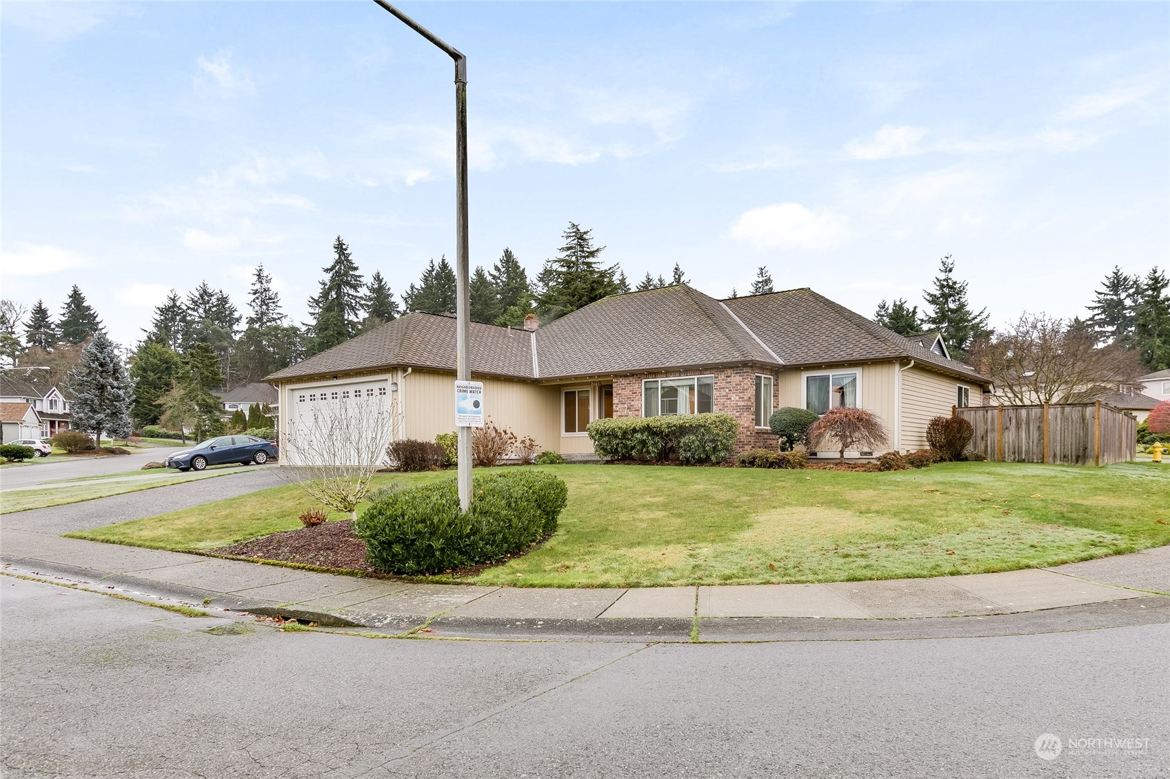 2667 Southwest 343rd Street Federal Way, WA 98023 - Photo 2 of 24 a front view of a house with a garden