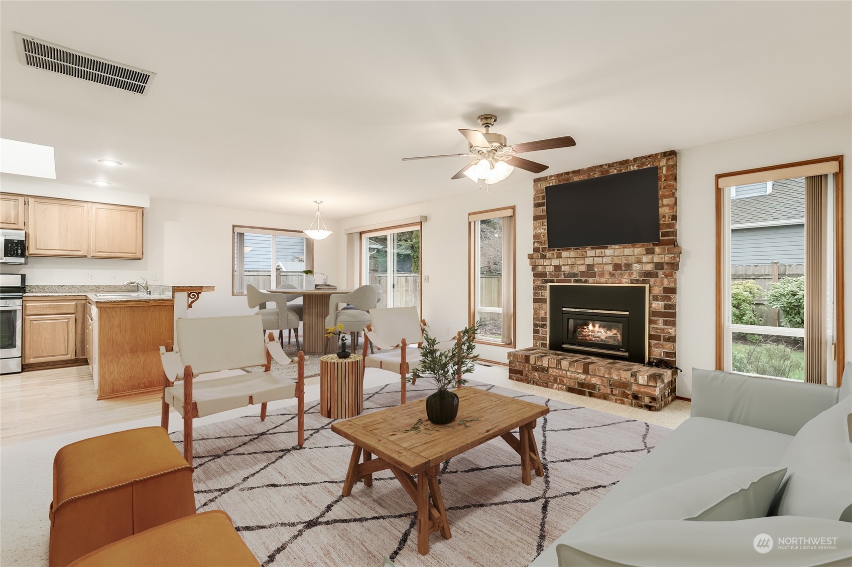 2667 Southwest 343rd Street Federal Way, WA 98023 - Photo 10 of 24 a living room with furniture and a fireplace