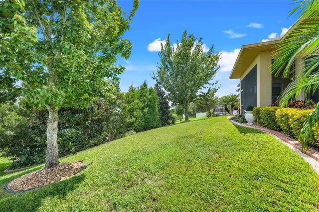 a view of a house with a big yard