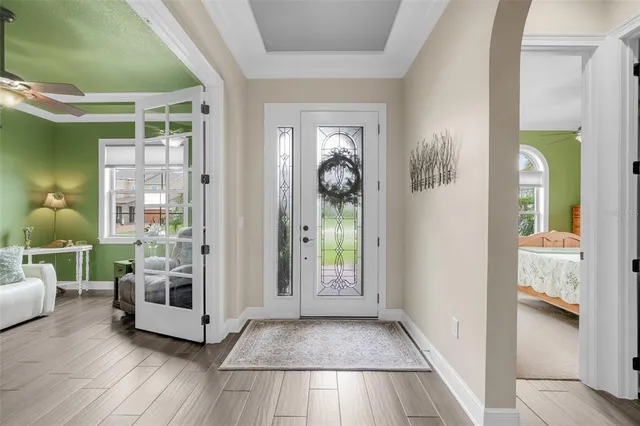 a view of a livingroom with furniture and windows