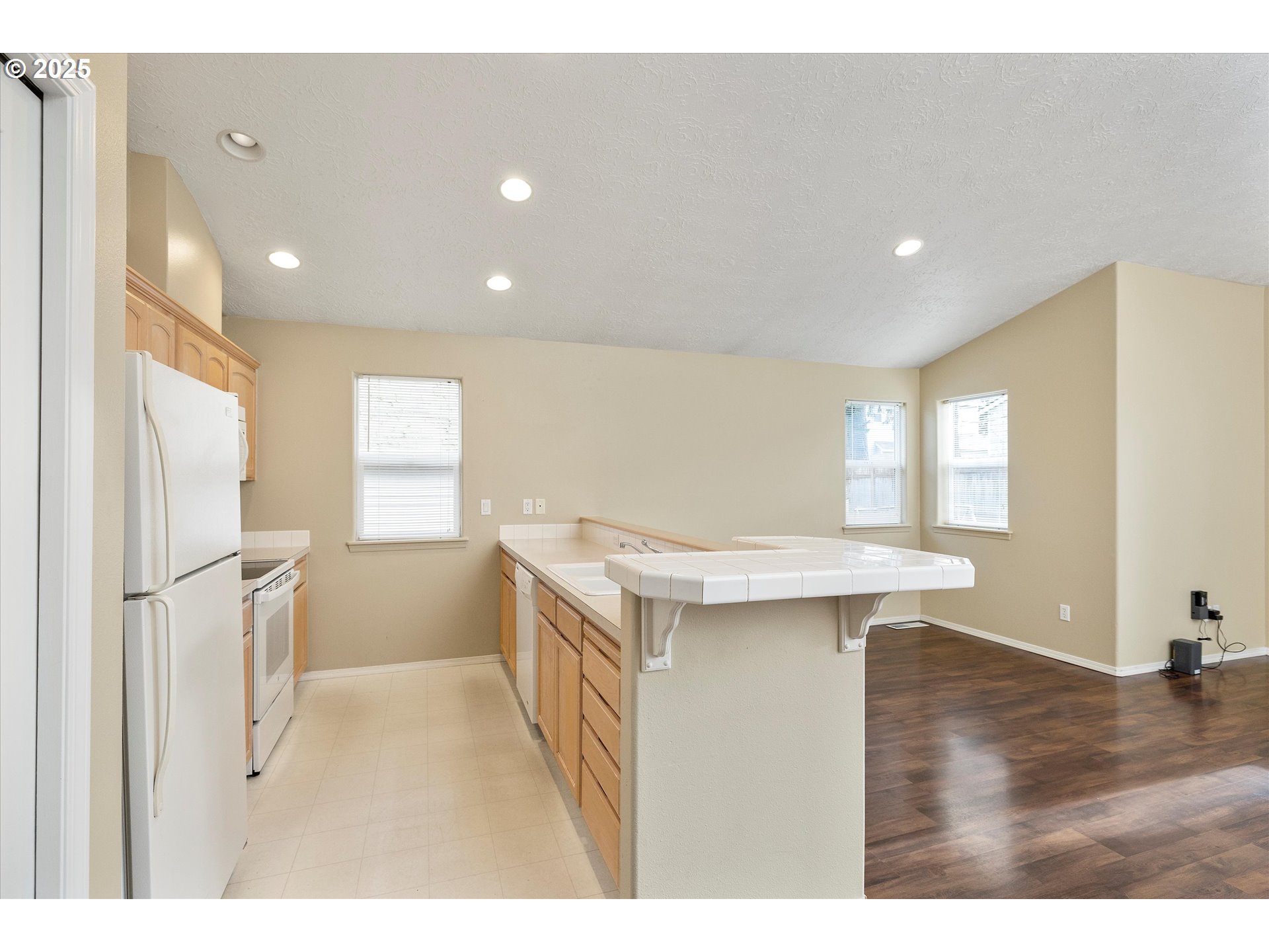 39302 Stratford Street Sandy, OR 97055 - Photo 10 of 25 a kitchen with a sink appliances and cabinets