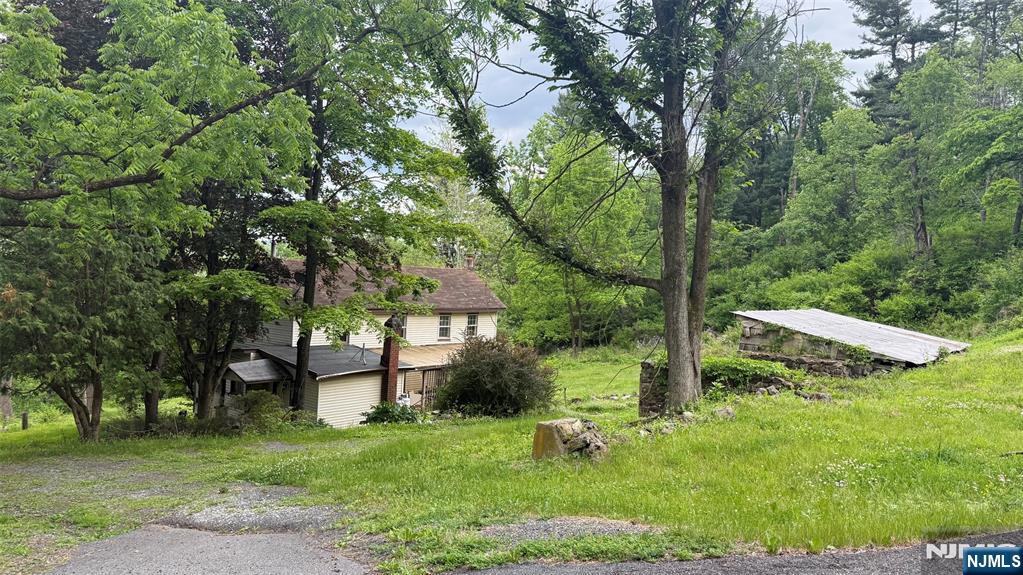 25 Coleman Hill Road Washington, NJ 07882 - Photo 3 of 18 a view of a house with a yard