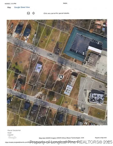 a black and white photo of a living room