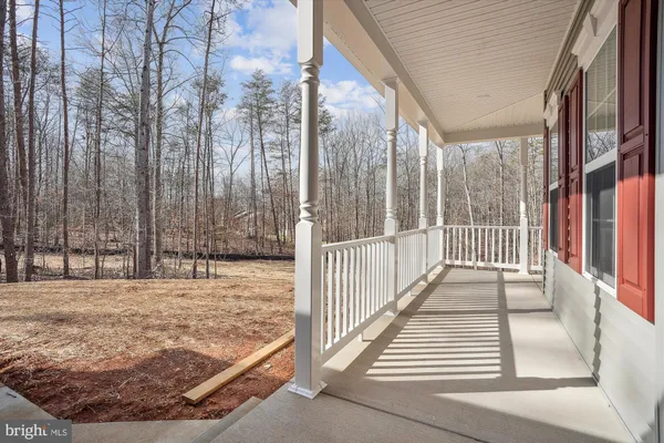 a view of a backyard of the house