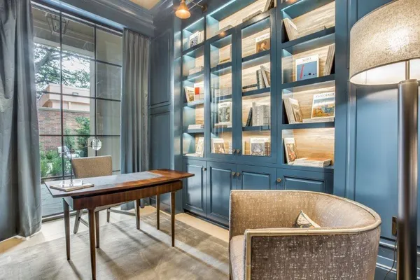 a room with a table and chairs