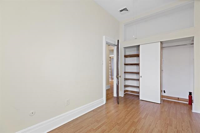 910 Hudson Street, Unit 3 Hoboken, NJ 07030 - Photo 11 of 14 a view of walk in closet with empty racks