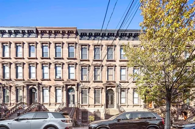 a front view of a building with street