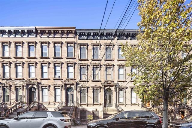 910 Hudson Street, Unit 3 Hoboken, NJ 07030 - Photo 13 of 14 a front view of a building with street